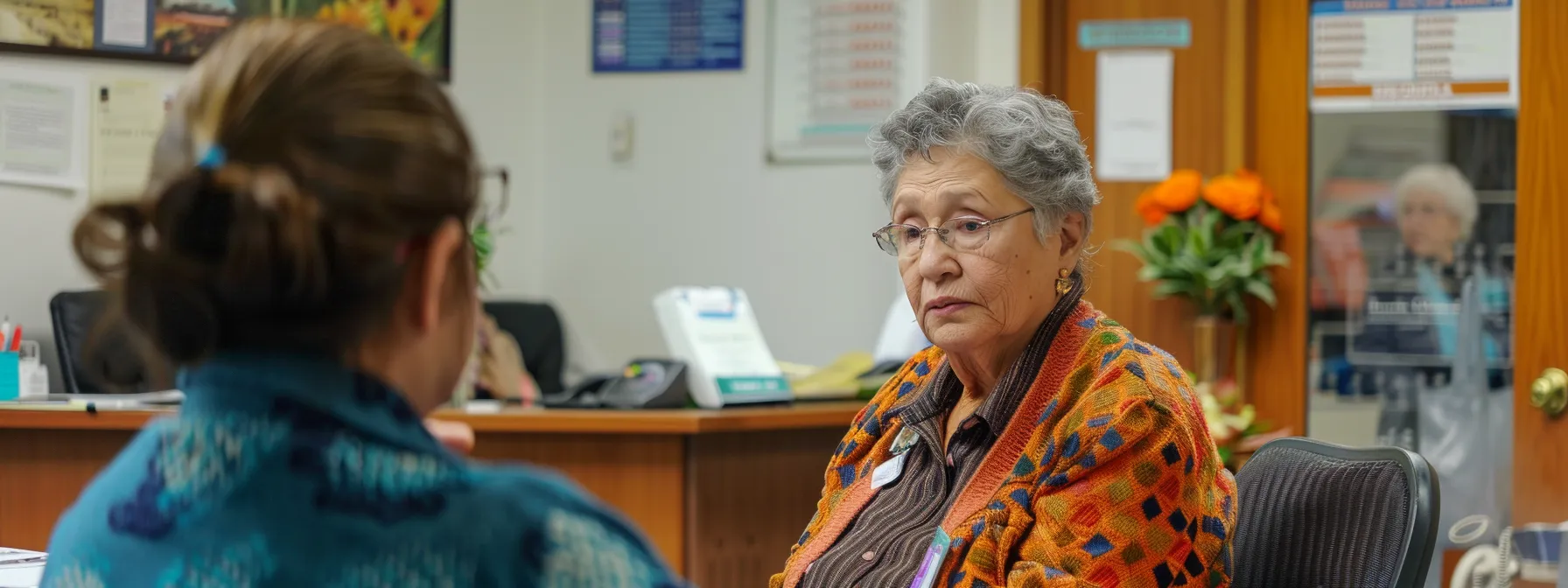 seniors receiving personalized medicare enrollment assistance at a social security office.