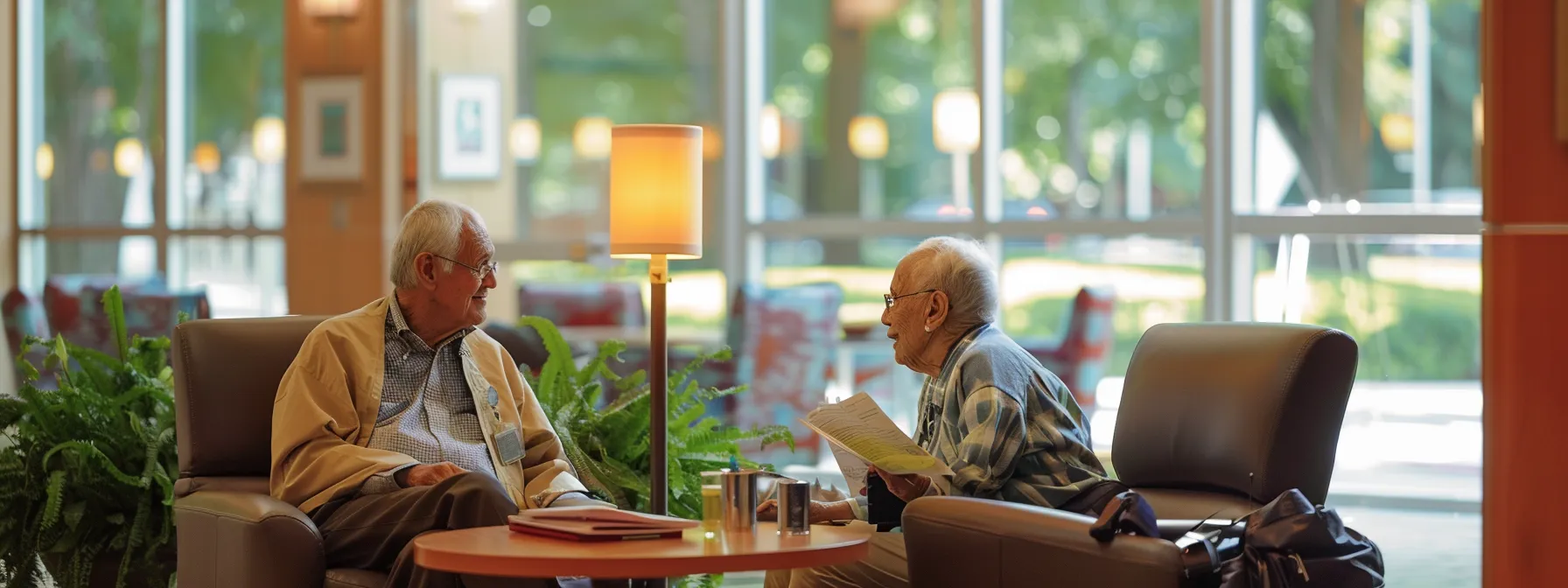 a senior couple engaging in a discussion with a healthcare provider, surrounded by educational materials on healthy living, financial assistance resources, and transportation options.