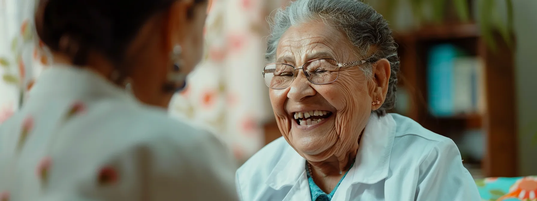 an elderly person smiling happily while receiving a free preventative care service.